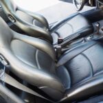 The leather seats are clean with no wear and tear, indicating that the car has been well taken care of.