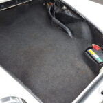 The front luggage compartment is also in excellent condition. The battery comes with a kill switch.