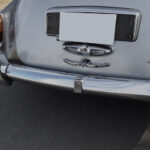 The RR emblem on the rear bumper indicates prestige.