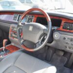 The steering wheel, door trim, and console hatch have all been carefully touched up.