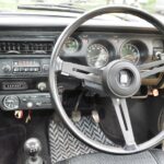 The original steering wheel is still in good condition.